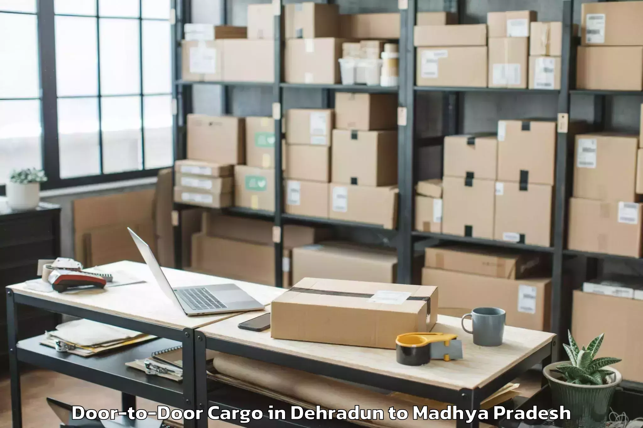 Affordable Dehradun to Saugor Door To Door Cargo